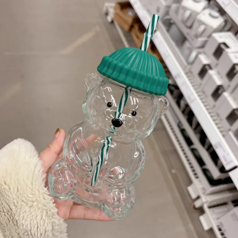 new cute bear-shaped glass cup comes with a straw. It is suitable for home, office, or bar use, and is fashionable and stylish.