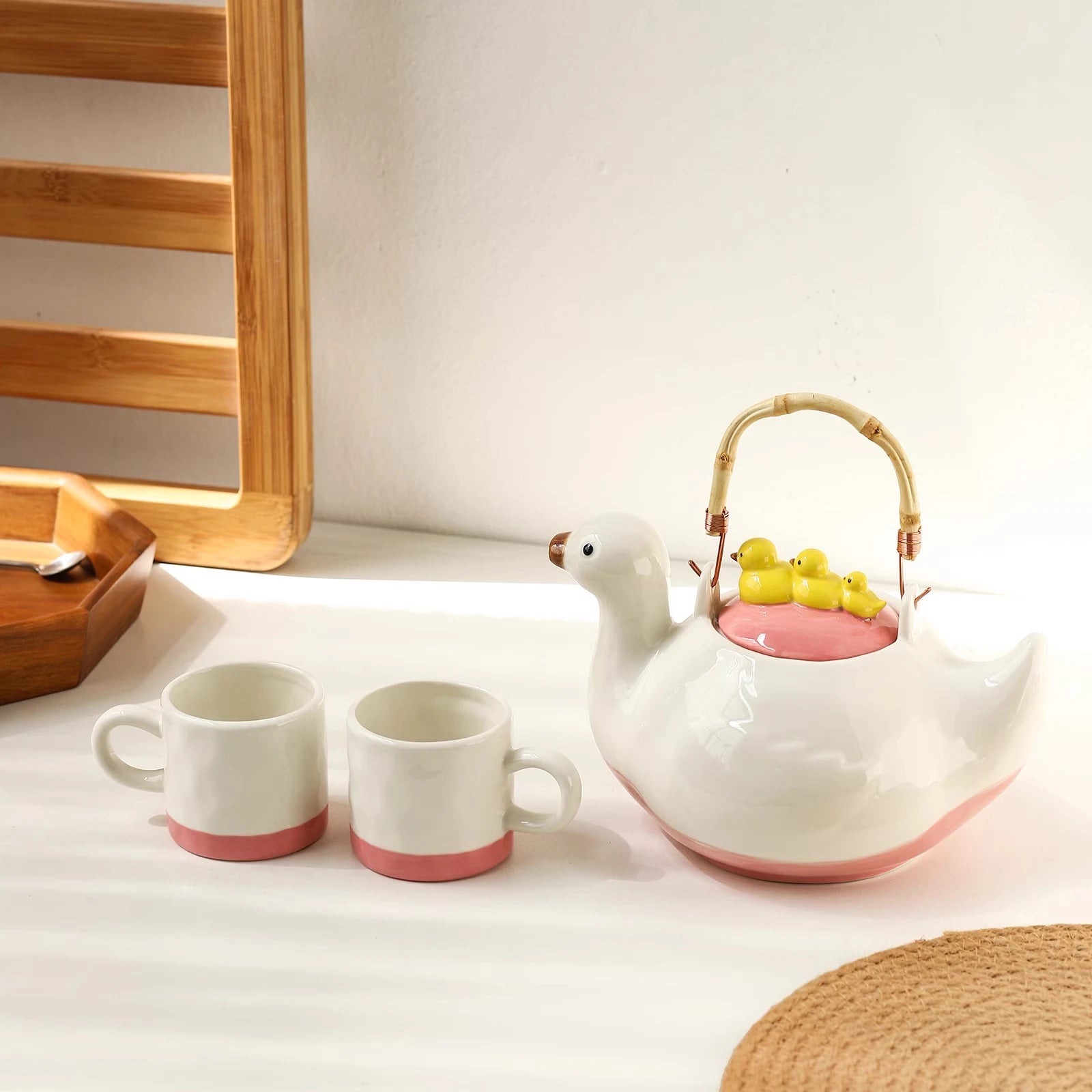 Ceramic duck-shaped water kettle, a charmingly designed cool water jug, suitable for afternoon tea teapot and cups.