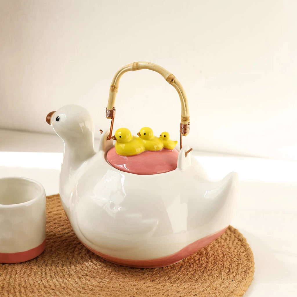 Ceramic duck-shaped water kettle, a charmingly designed cool water jug, suitable for afternoon tea teapot and cups.