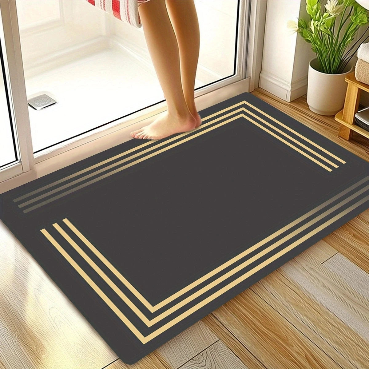 Luxurious thick anti-slip diatom mud floor mat - soft, water-absorbent, quick-drying, with elegant grey and gold striped design.